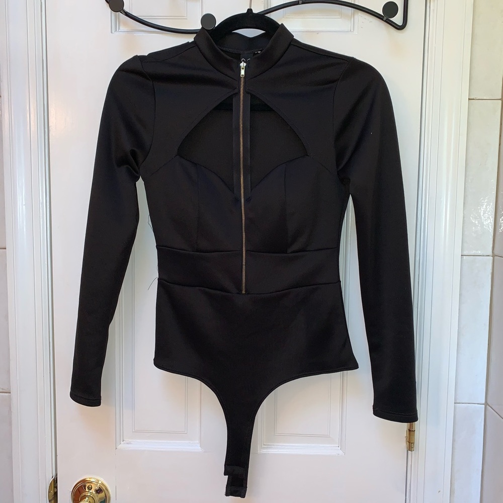 Black long sleeve open chest bodysuit.